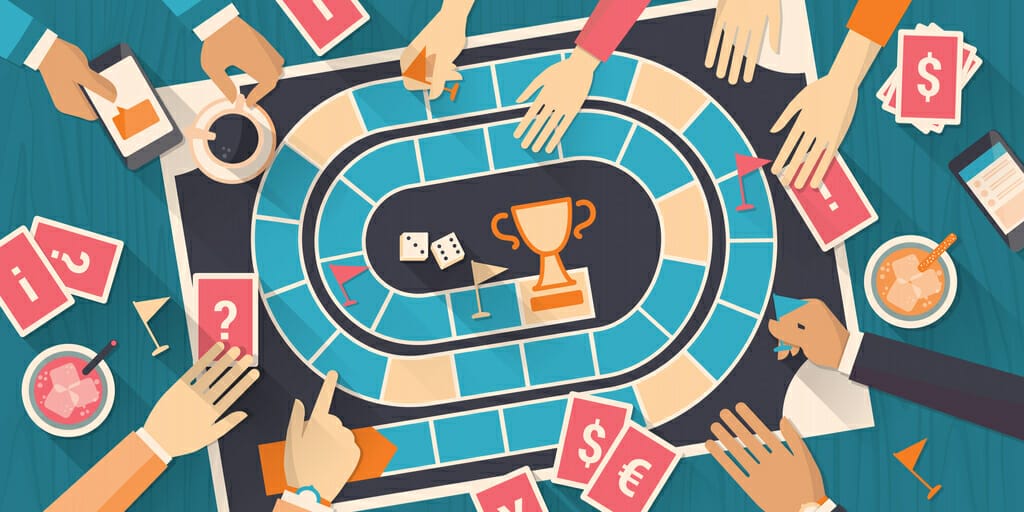 フランスでモノポリーのゲームをプレイする人々のグループ。 フランスでモノポリーのゲームをプレイする人々のグループ。